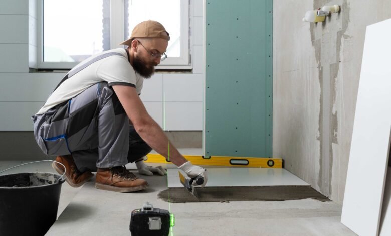 tiler-working-renovation-apartment-bathroom